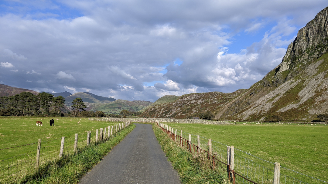 Welsh valley road with steep hills all around